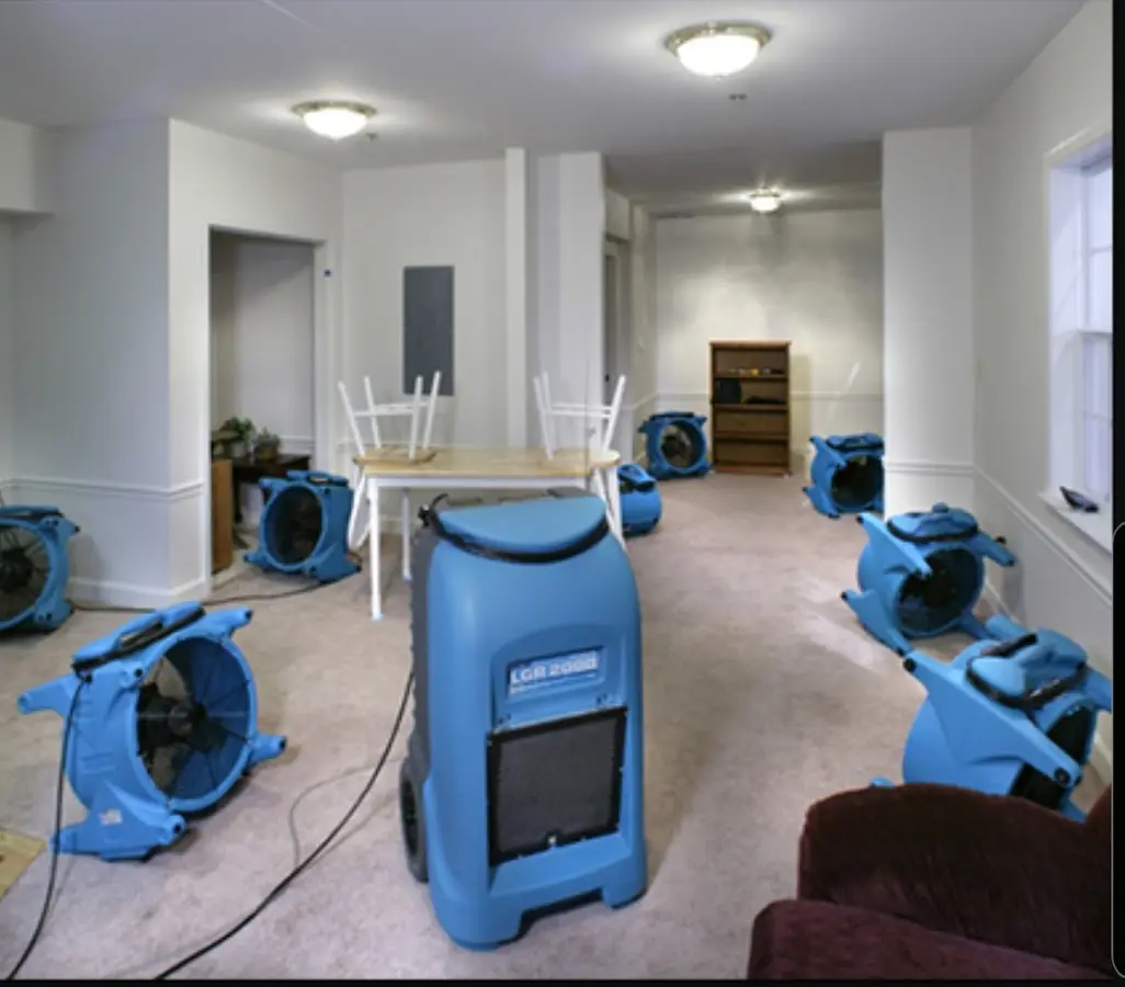 Air movers and dehumidifier setup for Water Damage Restoration in Allegany